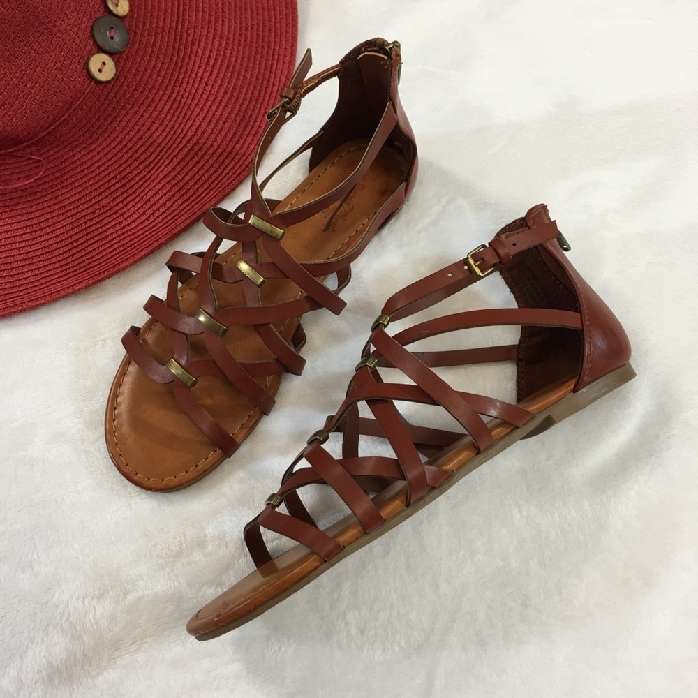Tan gladiator sandals.